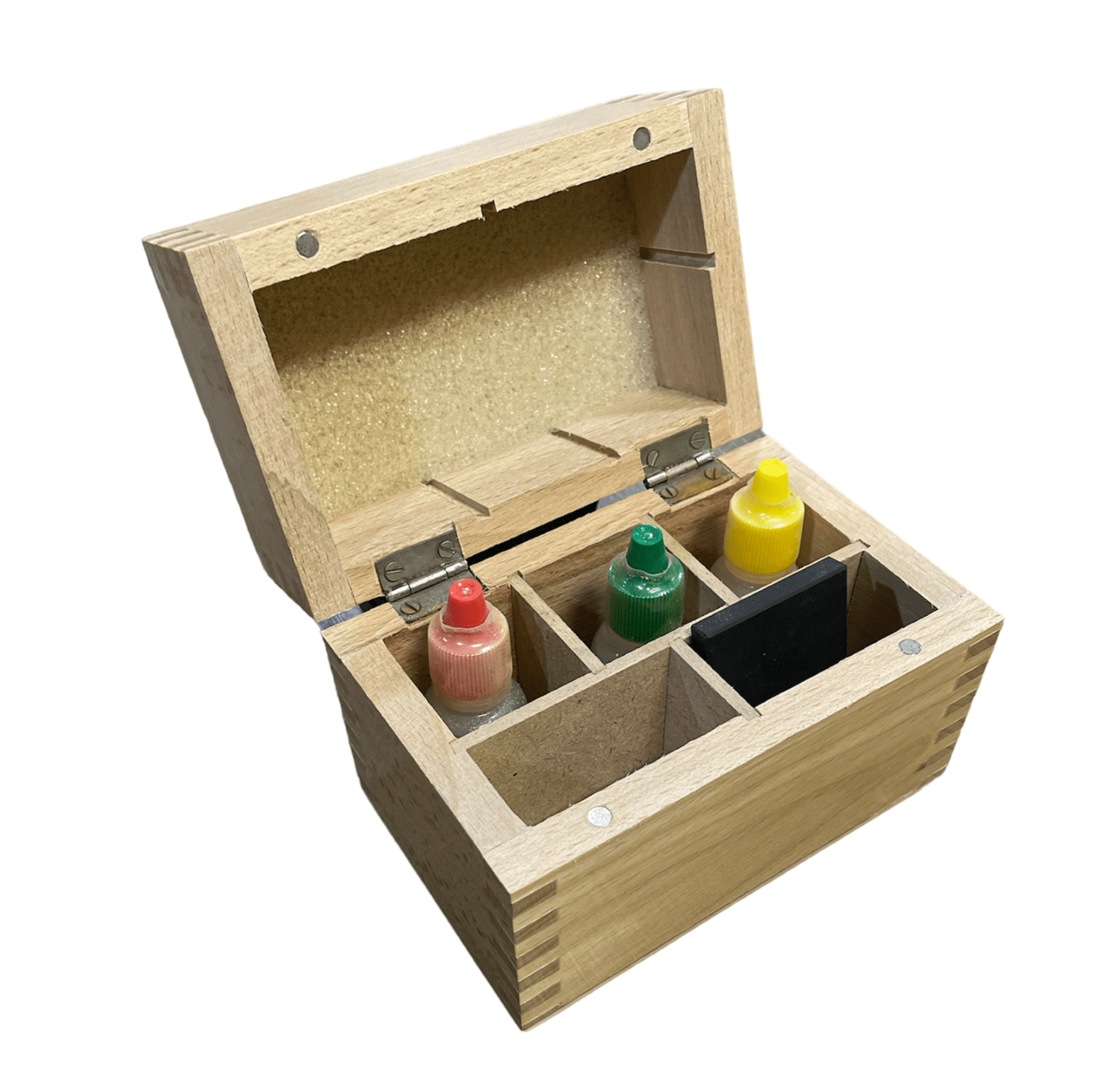 Gold testing acid solution kit with testing stone and wooden storage box side view.