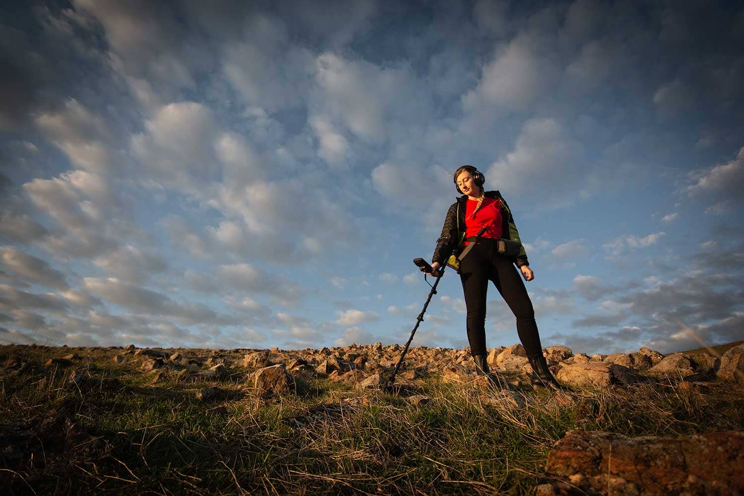 Woman metal detecting with the Minelab Manticore 