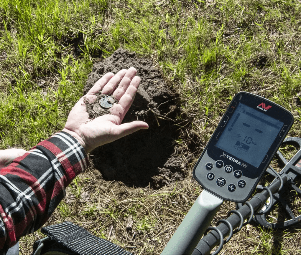 Minelab X-Terra Pro Metal Detector in the field lifestyle picture