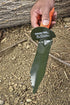 12 inch metal serrated edge metal detecting and gardening digging tool in a persons hand
