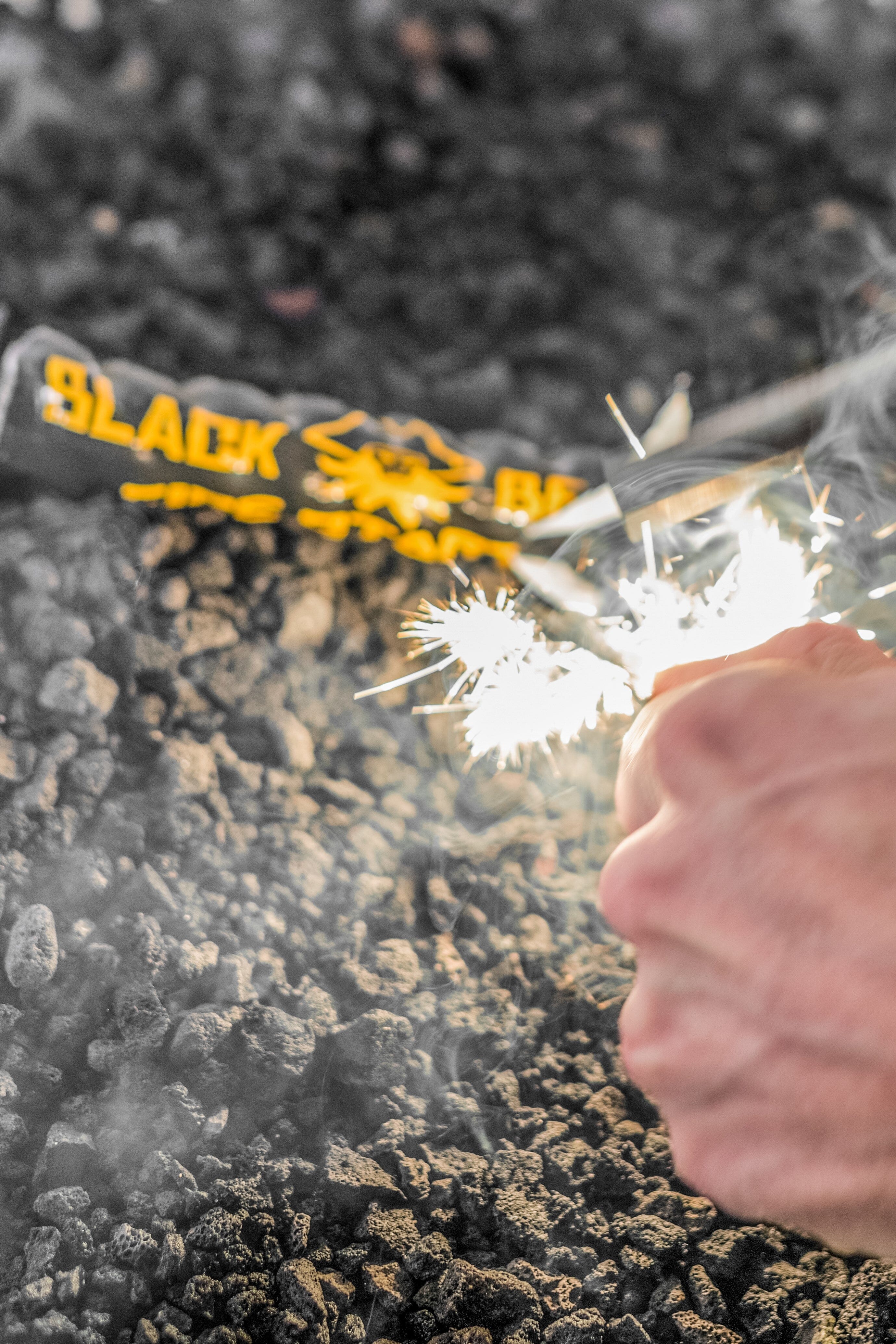 Black beard fire starter being ignited with ferro rod