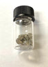 half ounce gold vial with pyrite