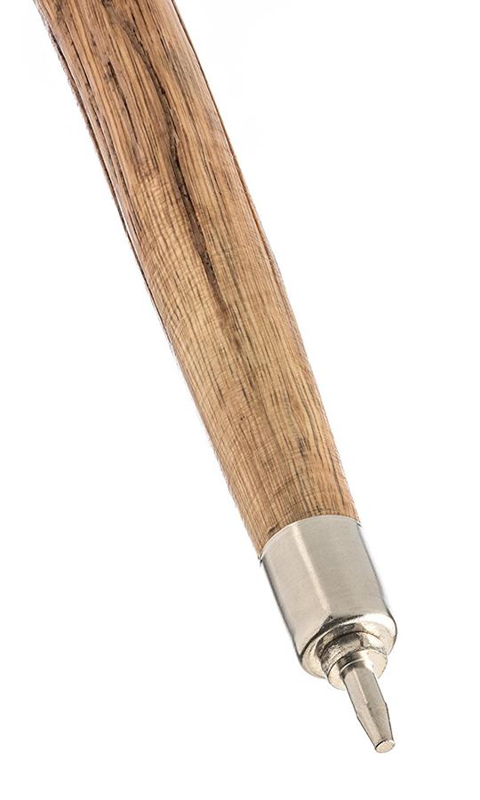 pointed end of collapsible wooden walking stick for picking up trash